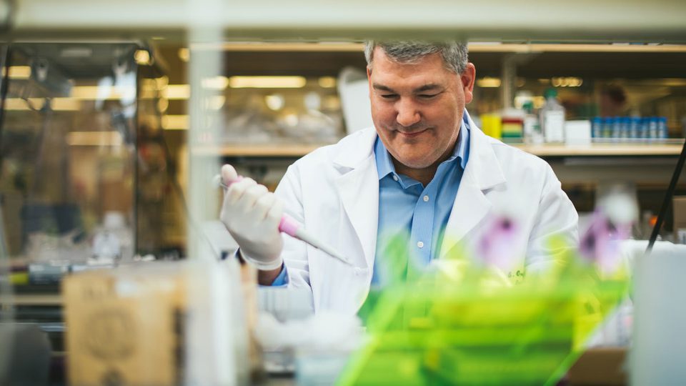 Photo of Dr. Kyle Orwig in the lab.